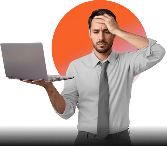 Stressed professional with laptop looking concerned