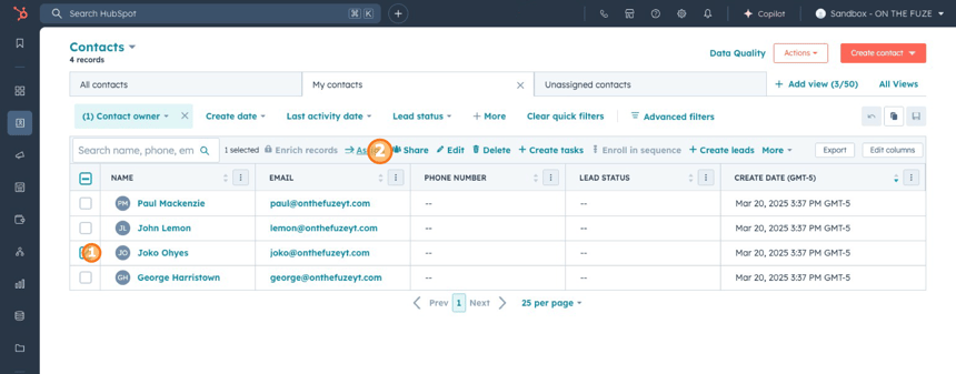 HubSpot CRM contact view with step indicators: 1 marking a selected contact checkbox, 2 highlighting the Assign button to set a contact owner.