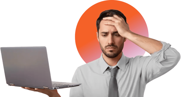 Man looking worried at a laptop