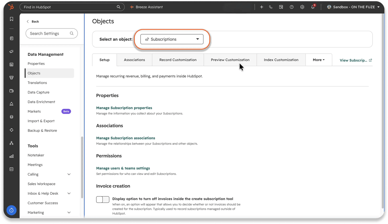 A screenshot of HubSpot's Objects settings page. The Select an object dropdown is highlighted in orange and set to Subscriptions, showing the Setup tab and the Invoice creation toggle that turns off invoices inside the create subscription tool.