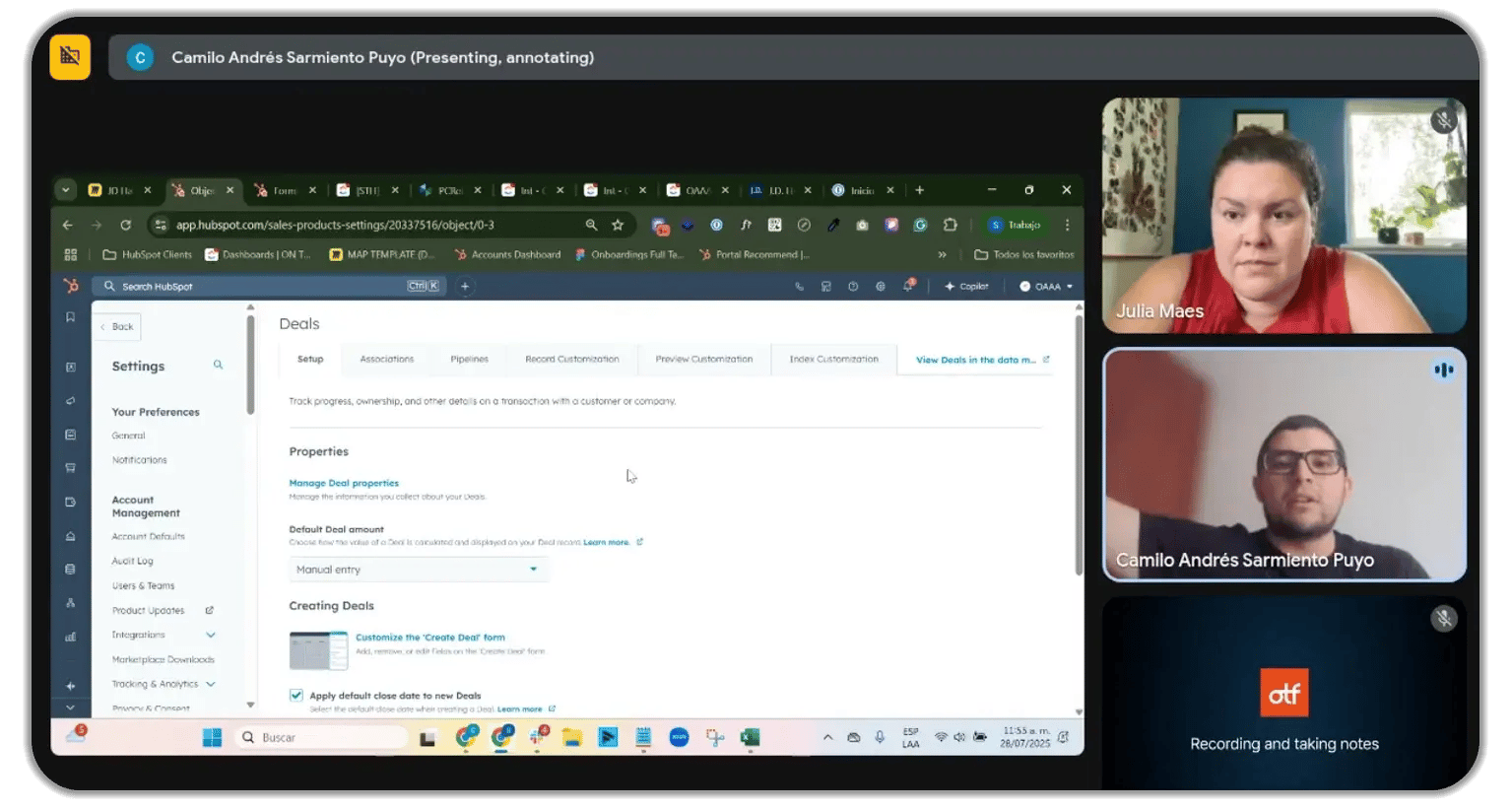 HubSpot CRM deals with the configuration screen during video call training, showing deal properties management and customization settings with two participants—Julia Maes and Camilo Andrés Sarmiento Puyo—in a training or consulting session.